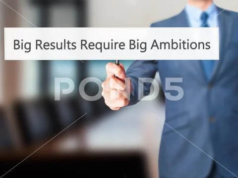 Big Results Require Big Ambitions - Businessman hand holding sig Stock Photos