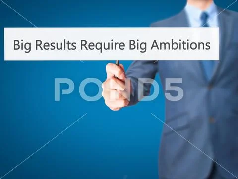 Big Results Require Big Ambitions - Businessman hand holding sig Stock Photos