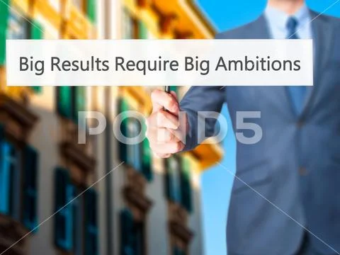 Big Results Require Big Ambitions - Businessman hand holding sig Stock Photos