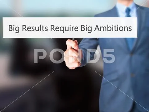 Big Results Require Big Ambitions - Businessman hand holding sig Stock Photos