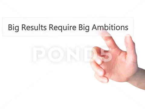 Big Results Require Big Ambitions - Hand pressing a button on bl Stock Photos