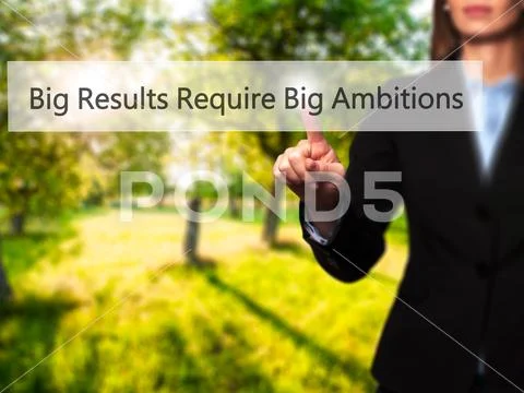 Big Results Require Big Ambitions - Businesswoman pressing high Stock Photos