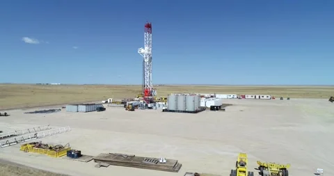 Big rig oil drilling fracking pad tower approach. Drone 4k 60fps. Stock Footage 167931326