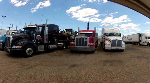 Big Rig Semi Tractor Trailer Trucks In Truck Stop Parking Lot 1 Stock-Footage 39742043