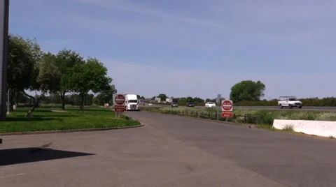 Big rig semi trucks, interstate 5, white truck off ramp Stock Footage 37254791