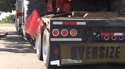 Big rig semi trucks, interstate 5, harvester, establishing wide load Stock Footage 37389207