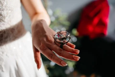 Big ring with a big diamond on the bride's hand, wearing wedding dress Stock Photos