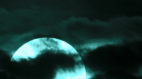 Big rising sun in grey clouds Stock Footage 150331251