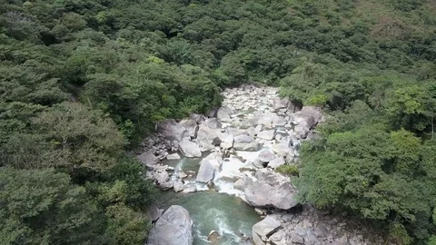 Big River in the Amazon jungle rainforest. Water flowing through rocks. Stock Footage 76154056