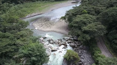 Big River in the Amazon jungle rainforest. Water flowing through rocks. Stock Footage 76154972