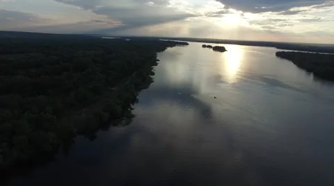 Big river during sunset and boat on the river. Aerial view, flight backward Video stock 63399674