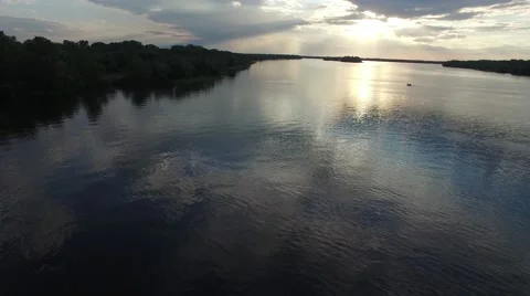 Big river during sunset and boat on the river Video stock 63399702