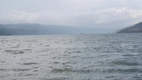 Big river surface by foggy day Stock Footage 80984074