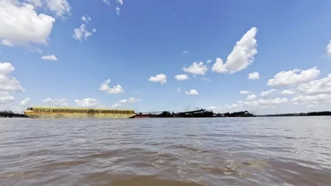 Big river view under blue sky with big cargo ship. 4K Stock Footage 289227304