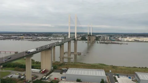 Big road cable-stayed bridge spanning wide river Stock Footage 161123533