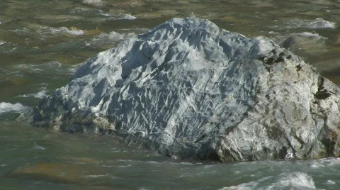 Big rock and river on background Stock Footage 125426