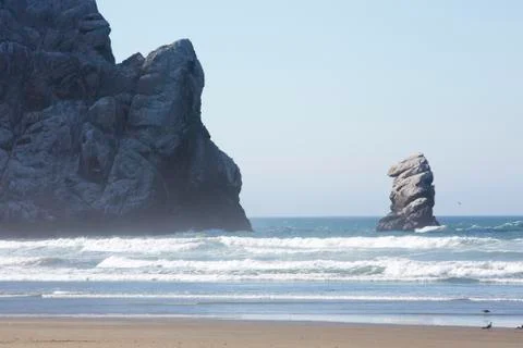 Big rock by the beach Stock Photos