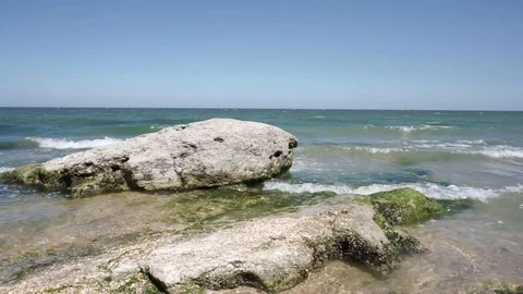 Big rock on the coast Stock Footage 112889752