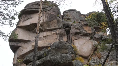 A big rocks in the dark autumn forest of the Siberian jungle. Stock Footage 297015593