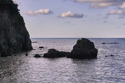 Big rocks in the ocean at low tide Stock Photos
