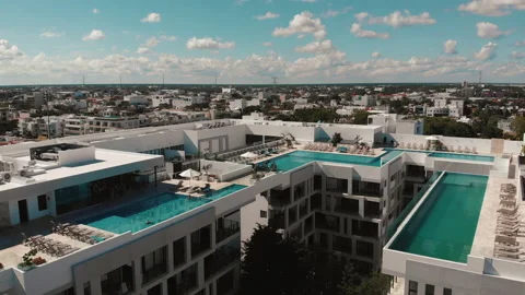 Big rooftop pools. Top view of the hotel in the resort town. Fly back off Stock-Footage 168155993