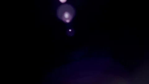 Big Rotating Optical Flare Stock Footage 80053246