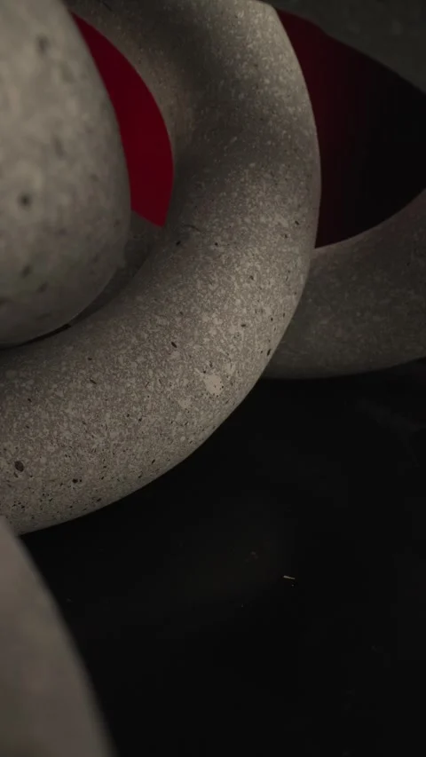 Big round circles made of tough stones interconnected together as a concept for Stock Footage 283983115