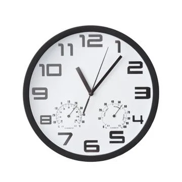 Big round clock on white wall. Stock Photos