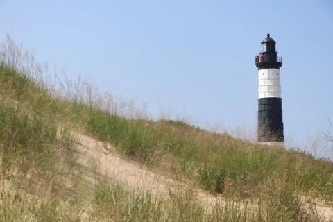 Big Sable Point Lighthouse Rising Above the Dunes in Daylight Stock Photos