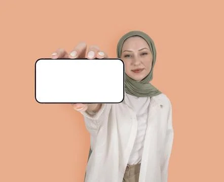 Big screen close up smartphone mock up, muslim woman holding. Stock Photos