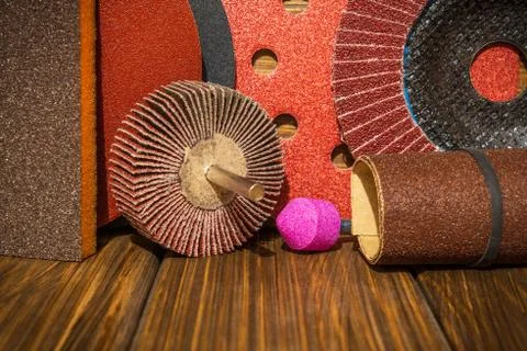 Big set of abrasive tools and sandpaper on vintage wooden boards Stock Photos