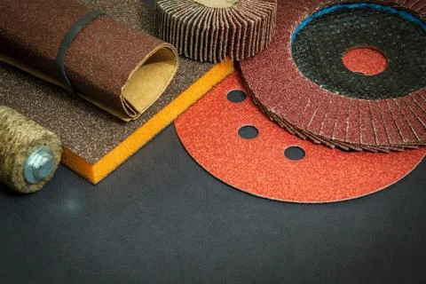 Big set of abrasive tools and multicolored sandpaper on black background Stock Photos