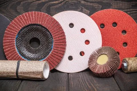 Big set of abrasive tools and multicolored sandpaper on wooden vintage black Stock Photos