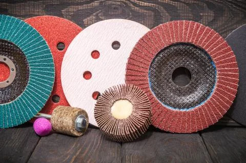 Big set of abrasive tools and multicolored sandpaper on wooden vintage dark w Stock Photos