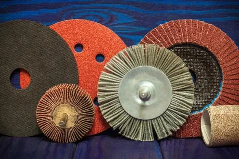 The big set of abrasive tools on blue vintage wooden boards wizard is used fo Stock Photos