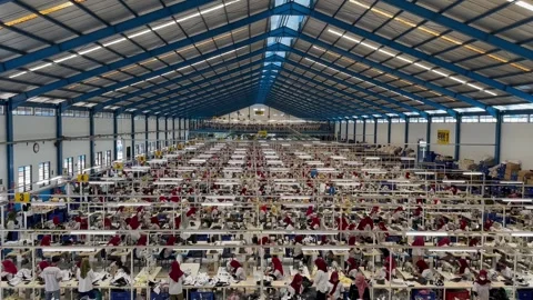 Big sewing machine factory crowded Factory employee 動画素材 296584312