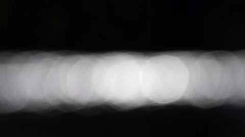 Big shining sparkles in the centre on dark water background Vidéo 55818347