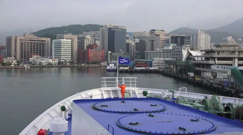 Big Ship Pulls Into Port With View Of Skyline Busan South Korea 4K Stock Footage 42145620