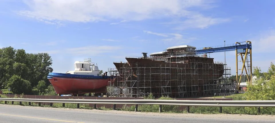 Big ship under construction at shipyard. Stock Photos