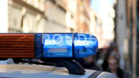 Big siren of a police patrol car at a roadblock for city security Stock Photos