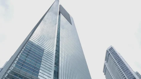 Big skyscraper in low angle in Miami brickell business district during the day. 動画素材 110768440