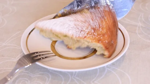 Big slice of apple pie placed in a plate Stock Footage 128806981