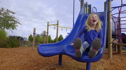 Big smile on a slide Stock Footage 56849023