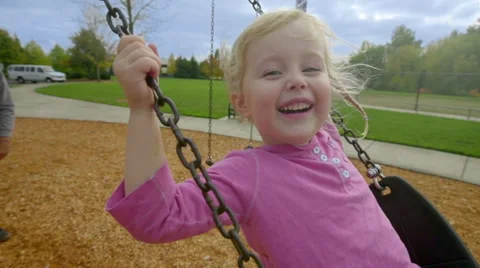 Big smile on swing Stock Footage 56694092