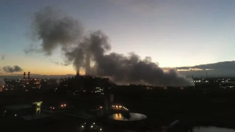 Big smoke heading left to sunset over mountains shown by Drone camera Video stock 141426851