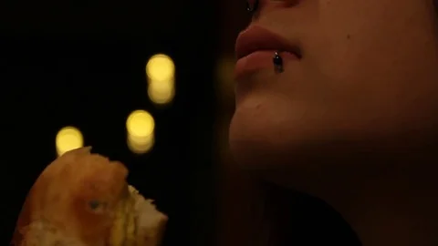 A big sniff of food, and chomp Stock Footage 78954669