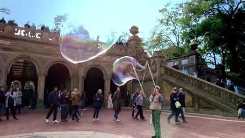 Big Soap Bubbles at Central Park 4K Stock Footage 69095542