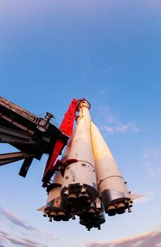 Big space rocket hang on the launchpad stand over sky Stock Photos