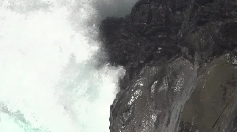 BIG SPLASH ON ROCK 1 Stock Footage 33344819