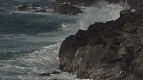 BIG SPLASH ON ROCK 2 Stock Footage 33344057